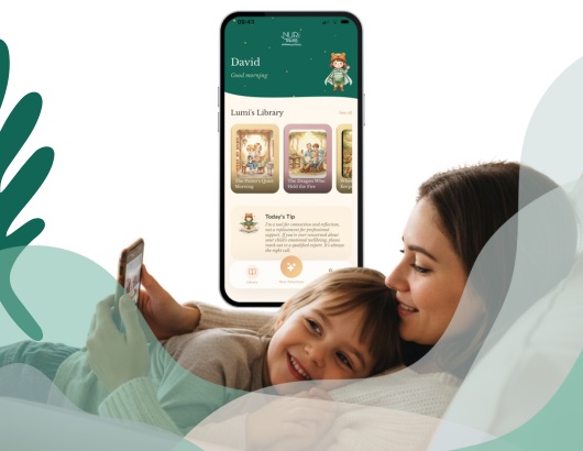 The Nuri Tales app on a phone, next to a parent and child reading together